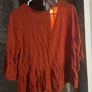 This shirt is really cute bell sleeves great neck line